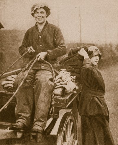 Women work force driving a cart by English Photographer